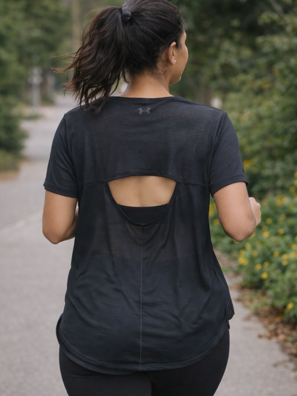 Under Armour SZ S NWT black sheer “Breathe” Tee with rear cut out, short sleeves